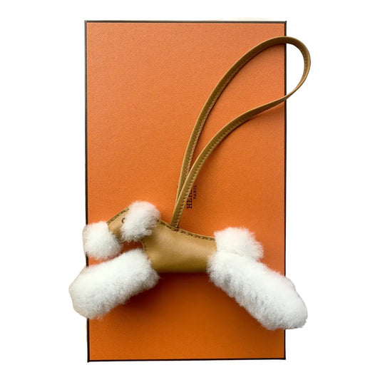 مجوهرات من كيس بادي فوكس تيرير على شكل ميرينوس وميلو كولور إيكرو/بسكويت.