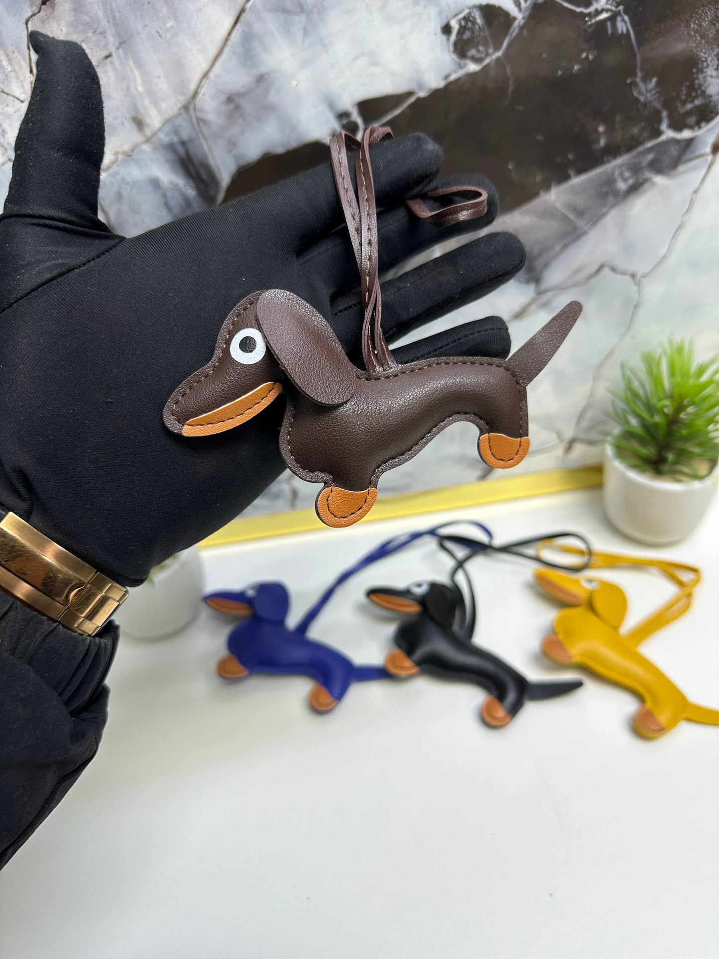 أكسسوار الحقيبة من الجلد للعلامة الايطالية